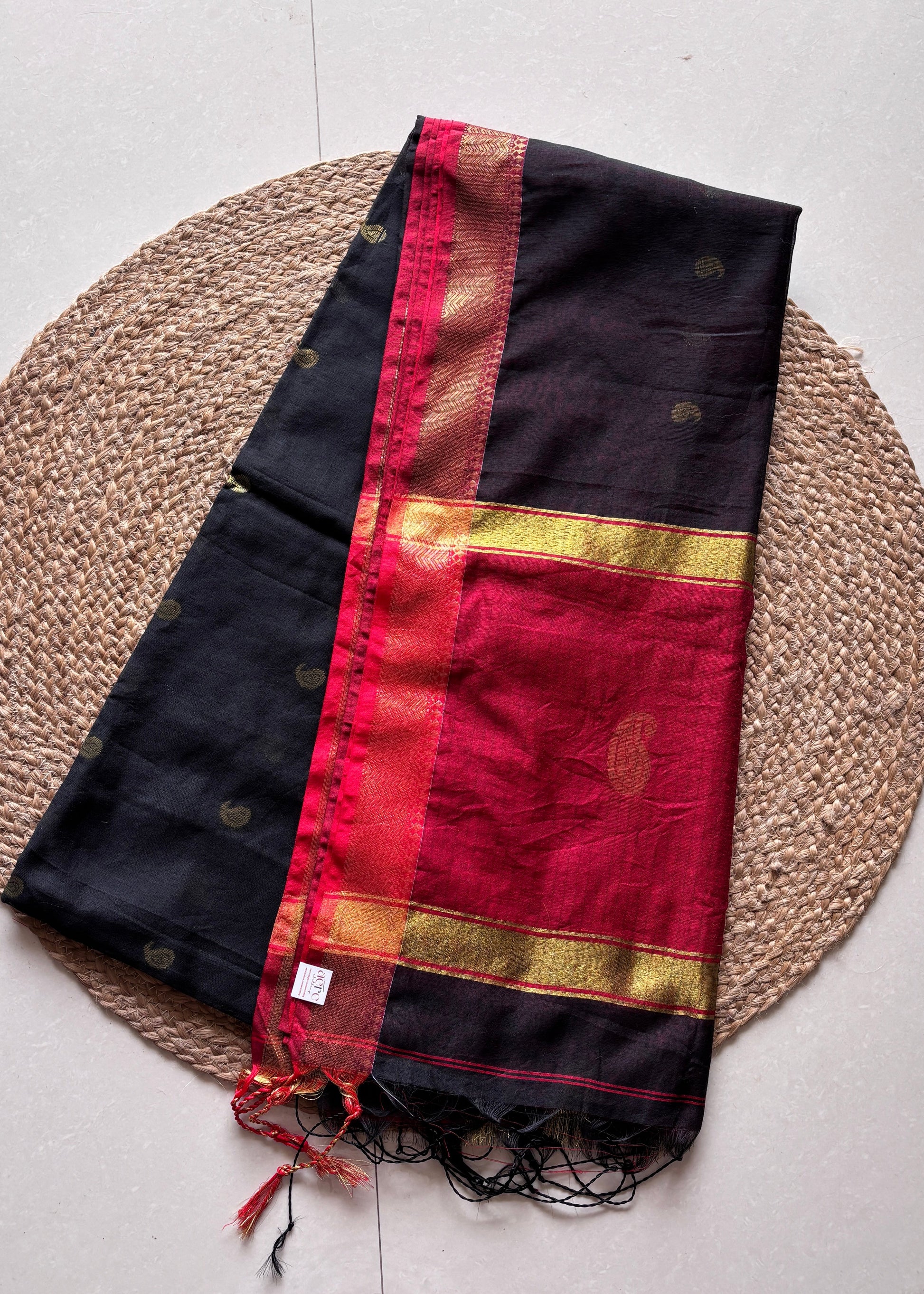 Black and red saree with gold border